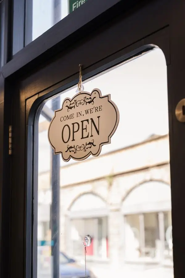 The open sign on the clinic door